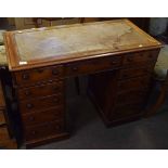 Victorian mahogany twin pedestal desk with gilt tooled leather inset, three frieze drawers and two