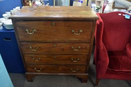 Mahogany secretaire chest, cross banded top over fall front enclosing a fitted top drawer, three