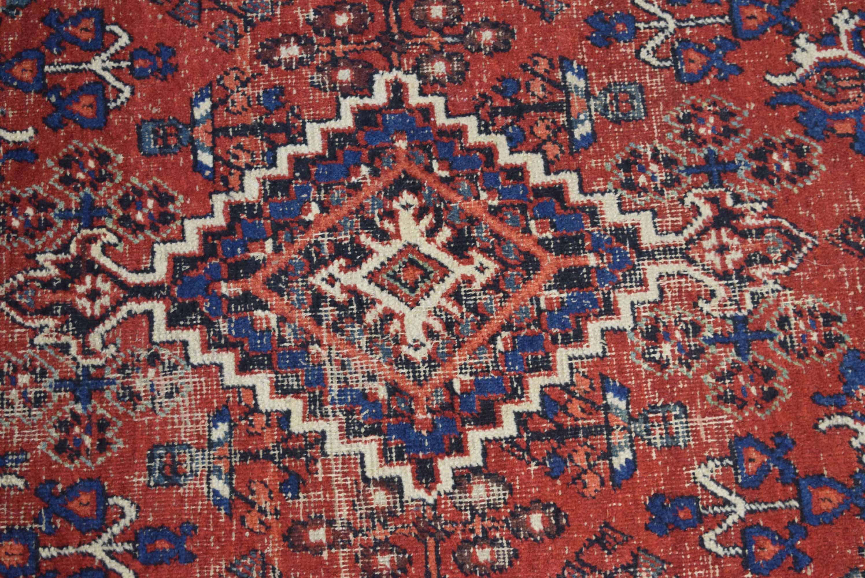 Late 20th century Caucasian wool carpet with multi-gull border, central panel of lozenge, mainly red - Image 2 of 2