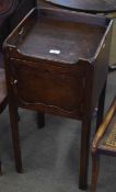 Late 18th/early 19th century pot cupboard with gallery top over single cupboard raised on