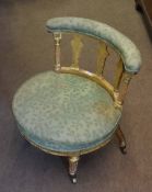 19th century giltwood and green floral upholstered small circular nursing chair with upholstered