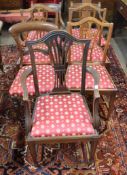 Harlequin set of seven dining chairs comprising a pair of bar back carver chairs, further
