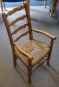 Lancashire style oak ladderback child's carver chair with rush seat