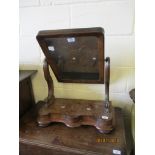 VICTORIAN MAHOGANY SWING MIRROR, HAVING A CUSHIONED RECTANGULAR GLASS TO A SCROLLED FRAME WITH