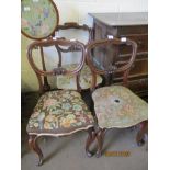 SET OF THREE VICTORIAN ROSEWOOD BALLOON BACK DINING CHAIRS WITH WORN WOOL WORK SEATS (3)