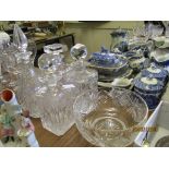 FOUR GLASS DECANTERS AND A FRUIT BOWL