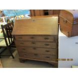 EARLY 19TH CENTURY OAK BUREAU WITH FALL FRONT FITTED INTERIOR AND FOUR DRAWERS BELOW, 94CM WIDE