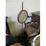 VICTORIAN MAHOGANY ADJUSTABLE POLE SCREEN HAVING A CIRCULAR SILK WORK PANEL OF EXOTIC BIRD AND