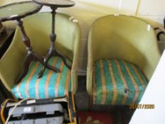 TWO WICKER LLOYD LOOM TYPE CHAIRS WITH STRIPED UPHOLSTERED SEATS