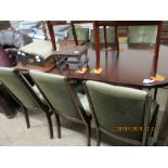 MODERN DINING SUITE WITH EXTENDING TABLE AND EIGHT GREEN UPHOLSTERED DINING CHAIRS