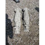 PAIR OF CONCRETE WHIPPETS LYING DOWN, 85CM LONG