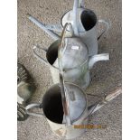 ONE 2-GALLON, 2 X 2 ½ GALLON TIN WATERING CANS