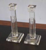 Pair of Waterford glass candlesticks, modelled with Corinthian columns on square bases with