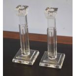 Pair of Waterford glass candlesticks, modelled with Corinthian columns on square bases with