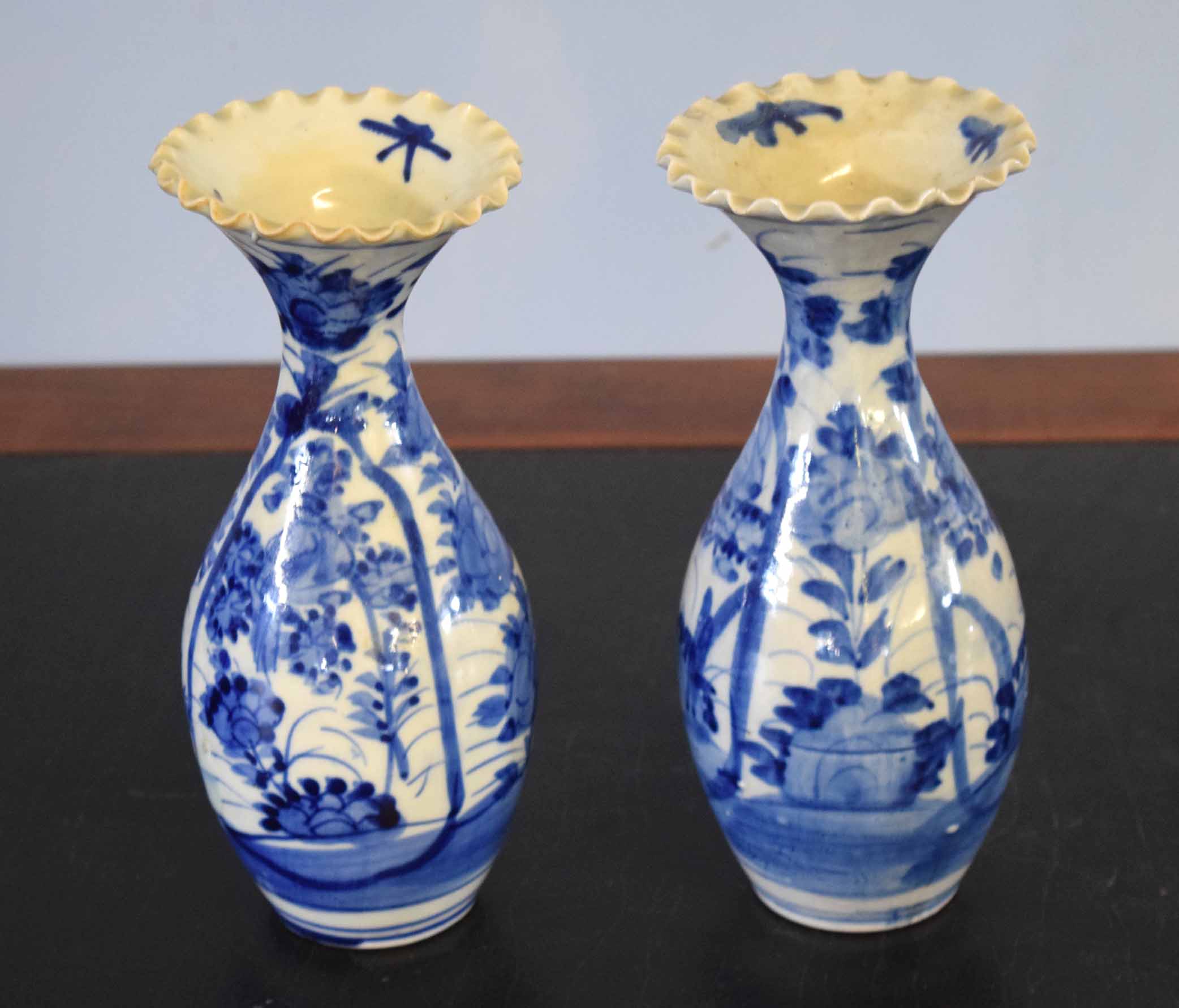 Pair of Japanese porcelain vases with blue and white design