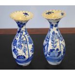 Pair of Japanese porcelain vases with blue and white design