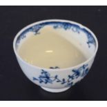 18th century Lowestoft porcelain tea bowl with blue and white floral design