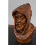 Carved pine head of a bearded gent wearing a peaked hood, 30cm high