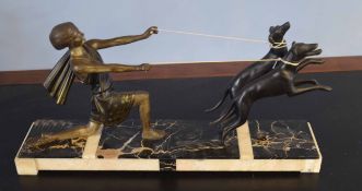 Art Deco style patinated metal group of girl with two hounds on a slate plinth, 50cm long