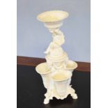 19th century Minton porcelain flower holder, white porcelain with three shells and cherubs above