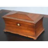 Large mahogany sarcophagus shaped tea caddy with two compartments and central bowl, 34cm wide