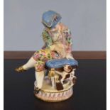 Continental porcelain model of a young boy with dog by his side, modelled in Meissen style