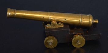 Vintage treen and brass model cannon