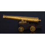 Vintage treen and brass model cannon