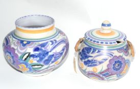 One mid-20th century Poole Pottery vase, and a jam pot and cover, pot with wicker handle, both