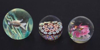 Three large 20th century globular paper weights