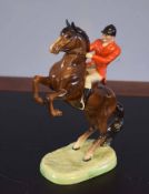 Beswick model of a huntsman on a rearing horse