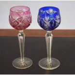 Pair of Waterford style cut glass wine glasses, 21cm high