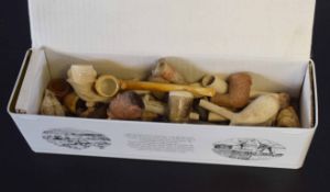 Collection of various clay pipes and other pipe bowls etc