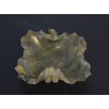 Spinach green jade dish with a carved bud handle and lobed shape