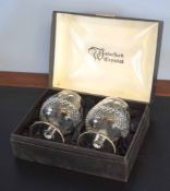 Box containing two Waterford crystal brandy glasses