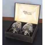 Box containing two Waterford crystal brandy glasses