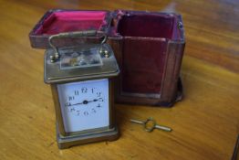 Victorian brass carriage clock in carrying case, 14cm high