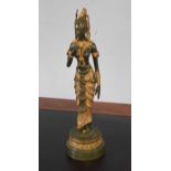 Oriental metal figure of a dancer on green base