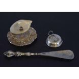 Silver handled button hook, silver and nacre shell ash tray and a further hallmarked silver stand