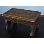 Small carved oak footstool, 40cm wide