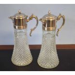 Pair of large claret jugs with silver metal mounts, 33cm high (2)