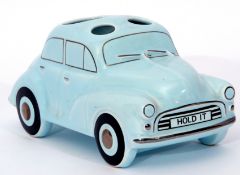 Sadler Pottery model of a container modelled as a Morris Minor car with the number plate Hold It,