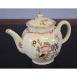 Lowestoft porcelain polychrome tea pot and cover decorated with a floral and cornucopia design (