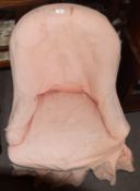 Victorian nursing chair with pink loose cover