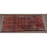 20th century Caucasian runner, all over central geometric pattern mainly pale red field with