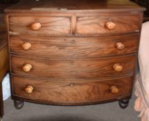 19th century bow front chest of five drawers on baluster feet, 93cm wide