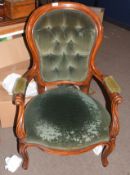 Victorian mahogany stained gents chair with green button back upholstery