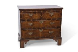 Late 18th century and later figured walnut and cross banded chest of two short over two long full