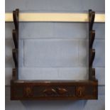 Oak wall mounting gun rack, frieze drawer below decorated with game birds, 61cm wide
