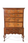 18th century and later walnut chest on stand, the upper section with four cross banded and hatched